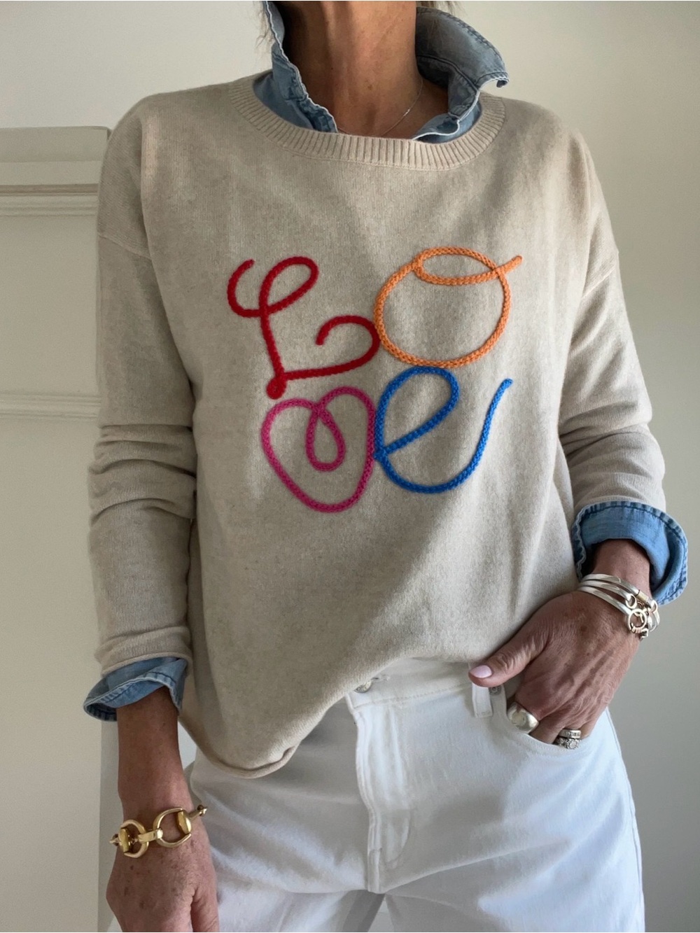 Beige 'Love' Crewneck 100% cashmere Sweater with Multicolor Embroidered Script.